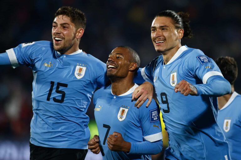 MONTEVIDEO, URUGUAY - SEPTEMBER 08: Nicolas de la Cruz (C) of Uruguay celebrates with Federico Valverde (L) and Darwin Nuñez of Uruguay after scoring the third goal of their team during a FIFA World Cup 2026 Qualifier match between Uruguay and Chile at Centenario Stadium on September 08, 2023 in Montevideo, Uruguay.